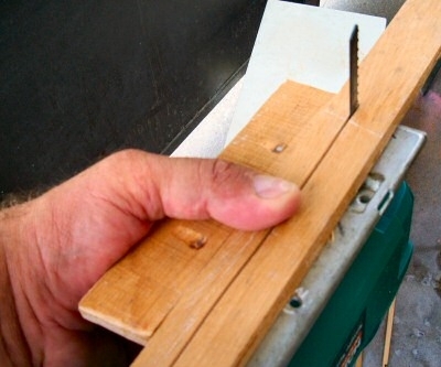 Using an electric jig-saw with a custom-made edge jig, we cut half-inch wide strips of wood from the half-inch thick hardwood stock
