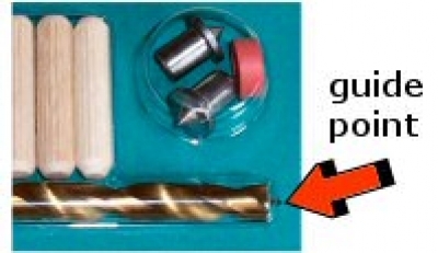 an extreme close-up of the tip of the doweling kit drill bit, showing the pointy needle-like guide tip