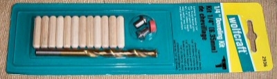 a doweling kit (special drill bit, wooden dowel rod, depth guide and hole-markers) for wood-working
